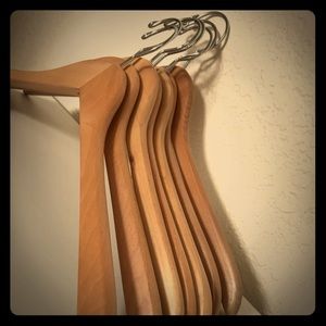 Like new set of 25 wooden hangers.